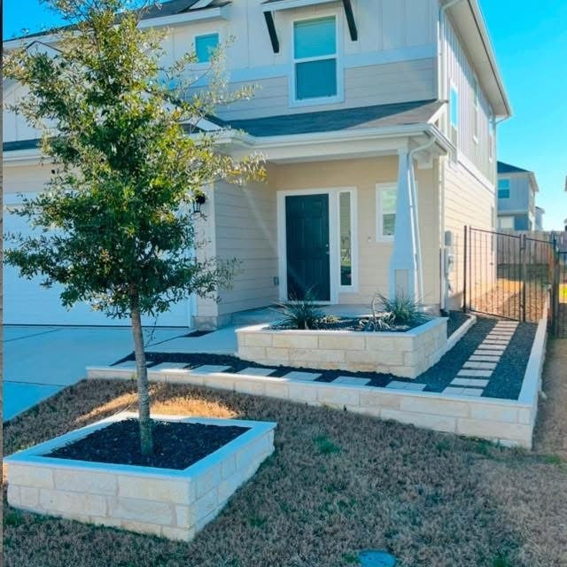 Retaining wall and planter